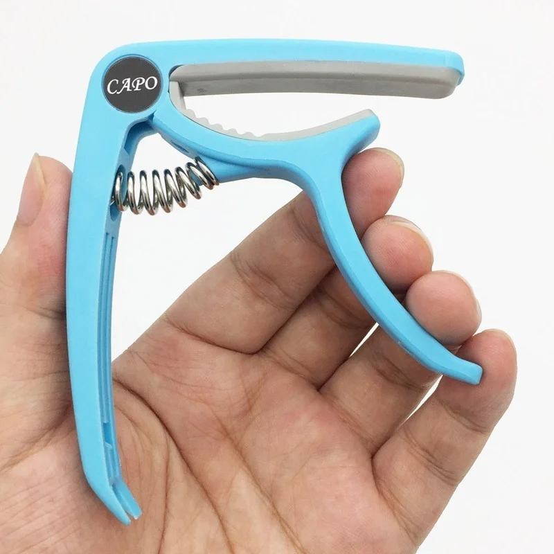 Plastikowy Capo gitarowy na 6  – Musical Instrument Dulcimer recenzja i cena