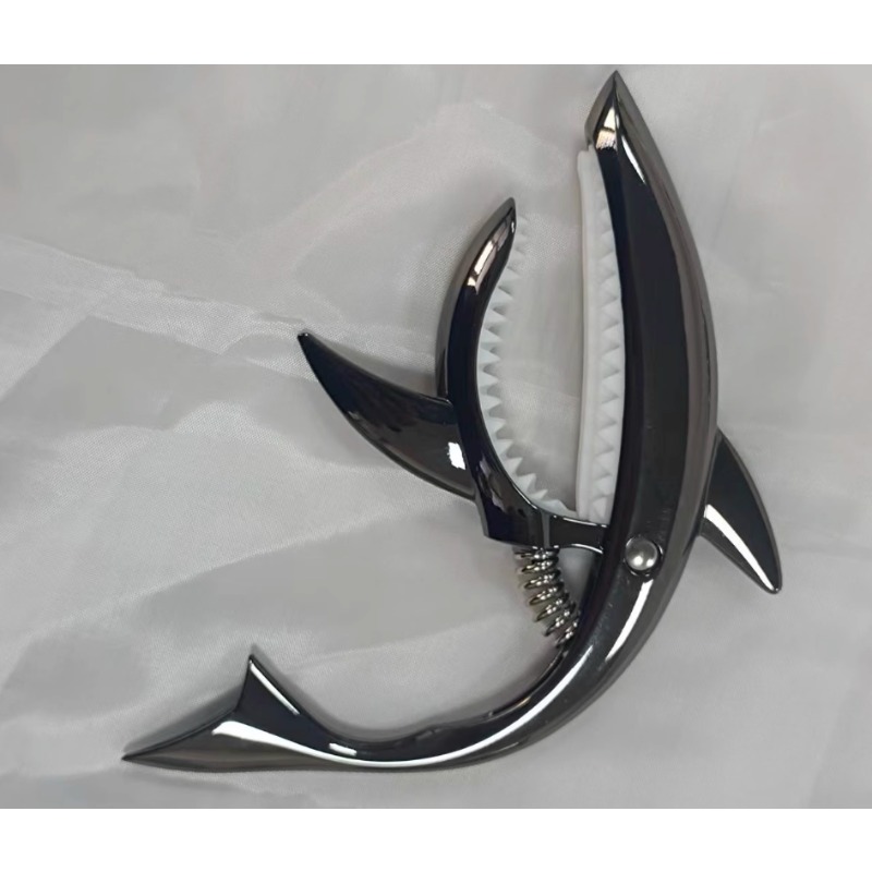 Kapodaster gitarowy Shark Desi – Musical Instrument Bass recenzja i cena