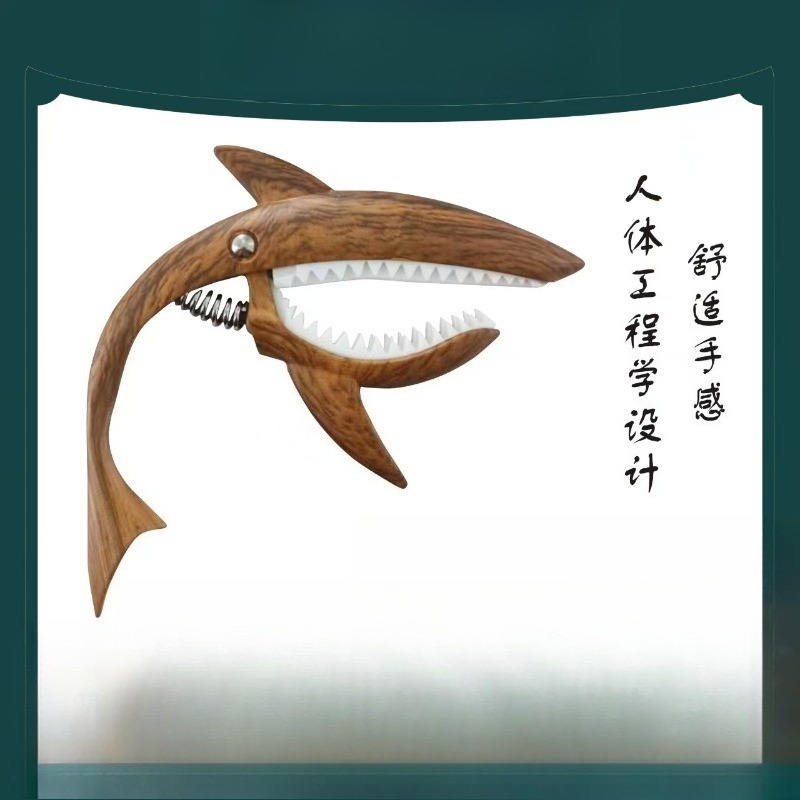 Kapodaster gitarowy Shark Desi – Musical Instrument Bass recenzja i cena